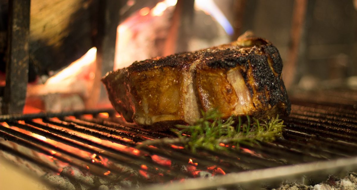 Cooked T-Bone Florentine Style Steak on a grill